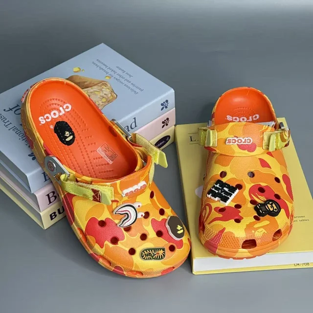 Crocs Sandals Ventilated clogs with heel straps and decorative charms product detail image 12