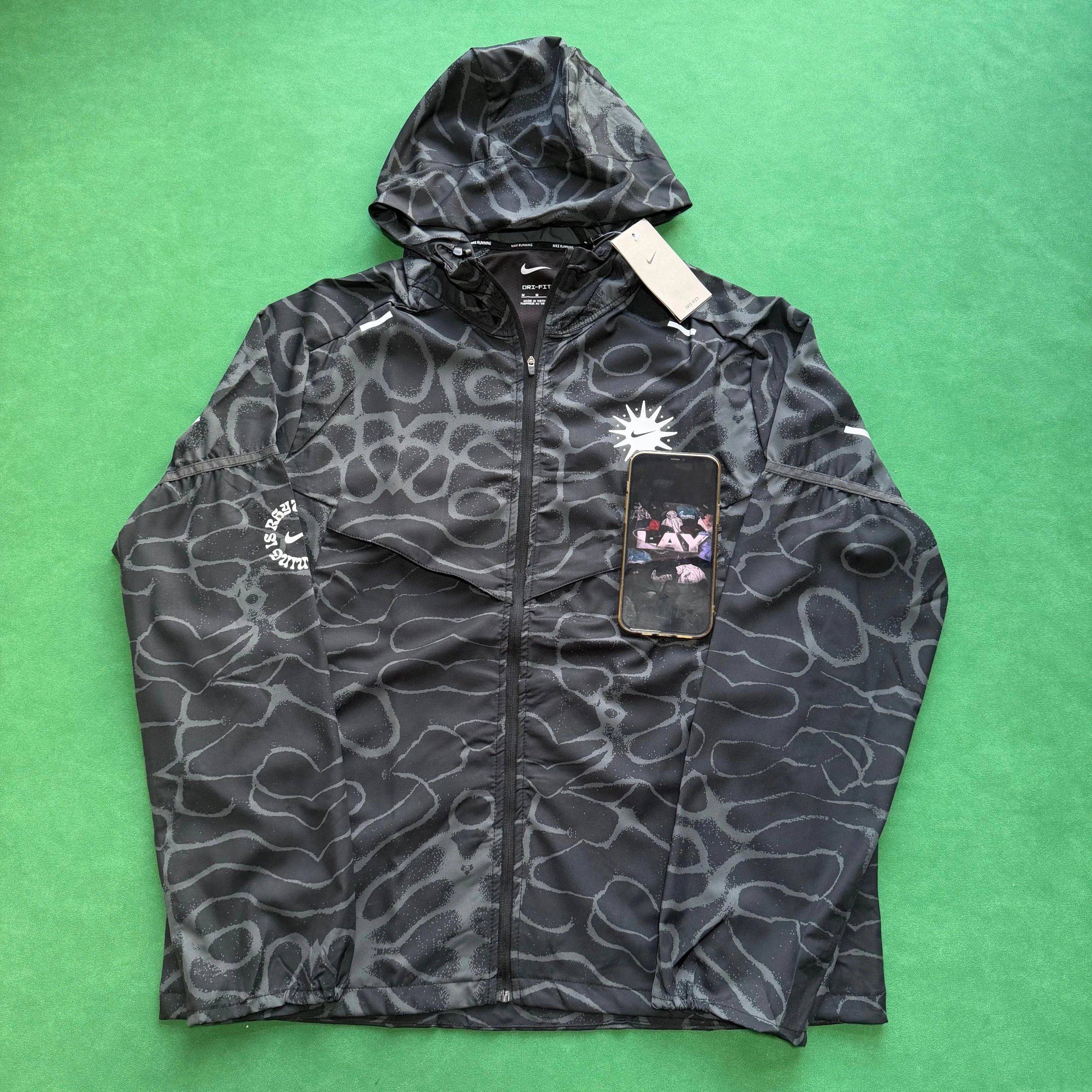Nike Tracksuits Hooded zip-up patterned tracksuit image 3
