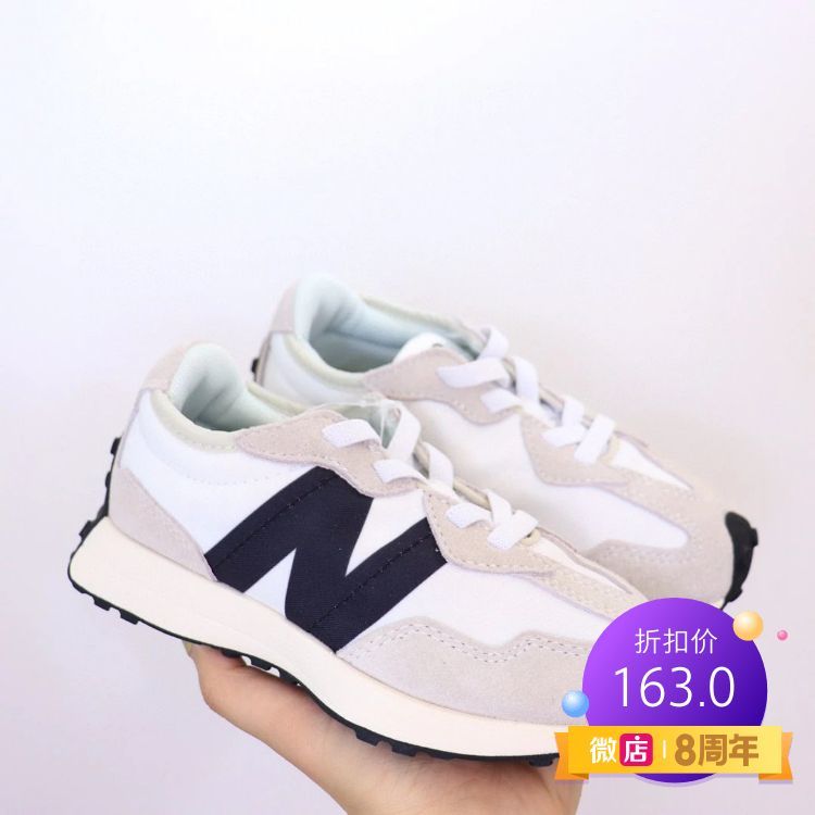 New Balance White and Navy Sneakers