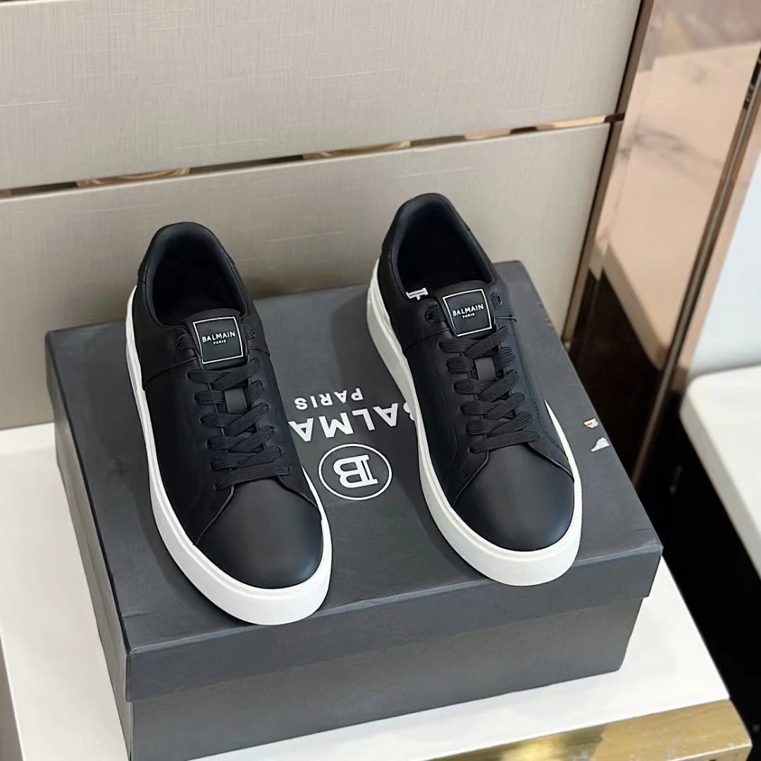 Balmaim巴尔曼 B-Cour光滑小牛皮和字母标识尼龙运动鞋 侧面饰以Balmain对比色迷你标志 双鞋带开合 Balmain Paris压花皮革标志 对比