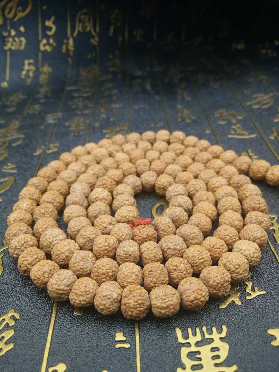 印尼正宗一代麟鳞纹小金刚菩提108颗佛珠手串,姜黄皮矮桩爆肉麒麟小