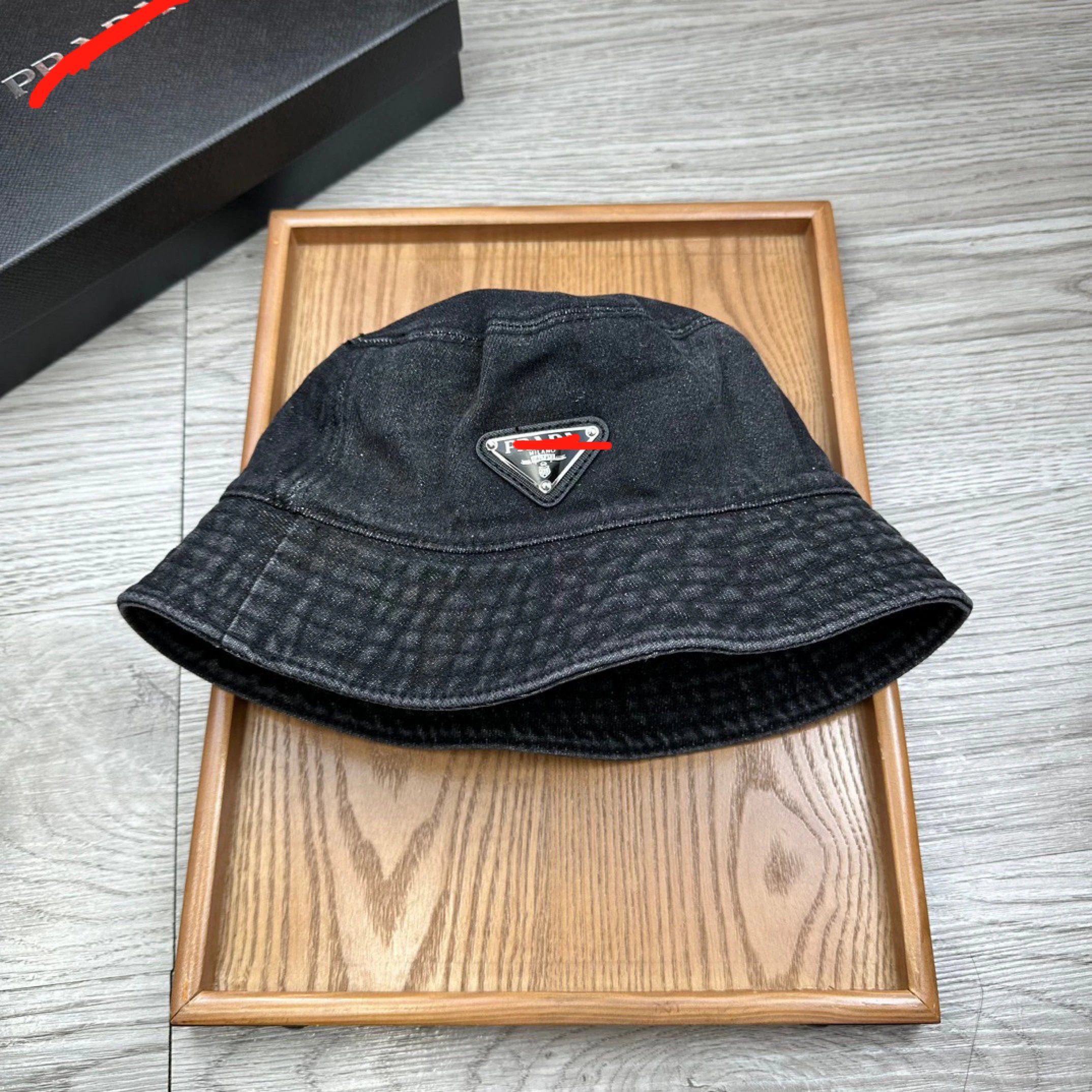 Prada Triangle Logo Bucket Hat in Denim and Nylon