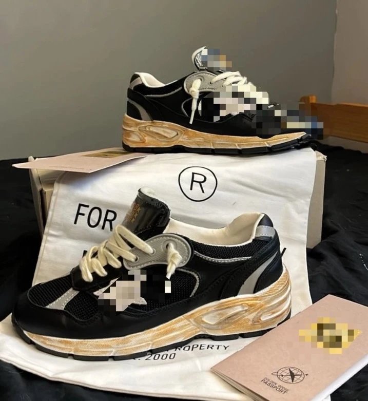 Golden Goose Super-Star Black and Silver Platform Sneaker