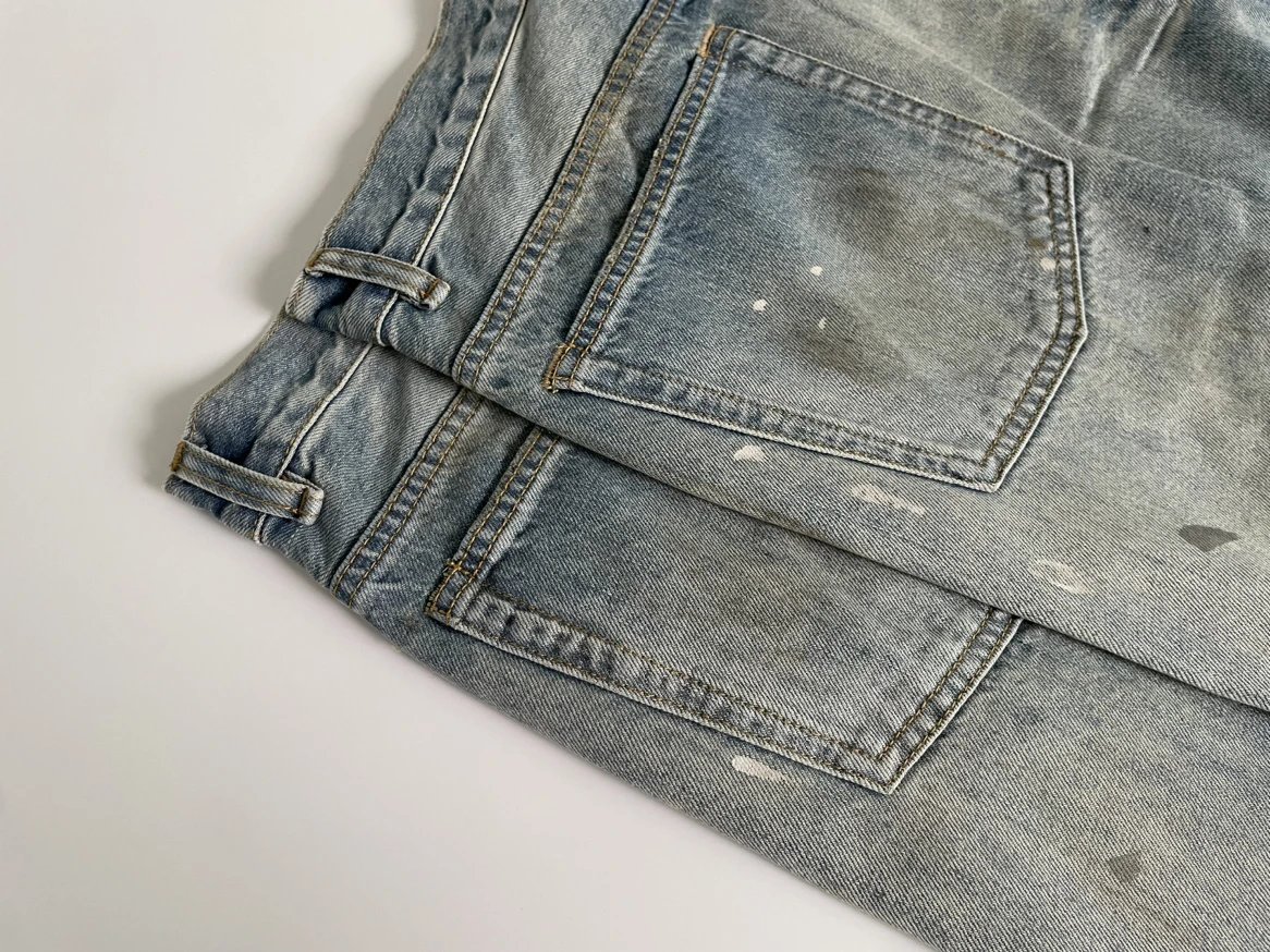 Design Wide-Leg Paint-Splatter Denim Jeans - 9
