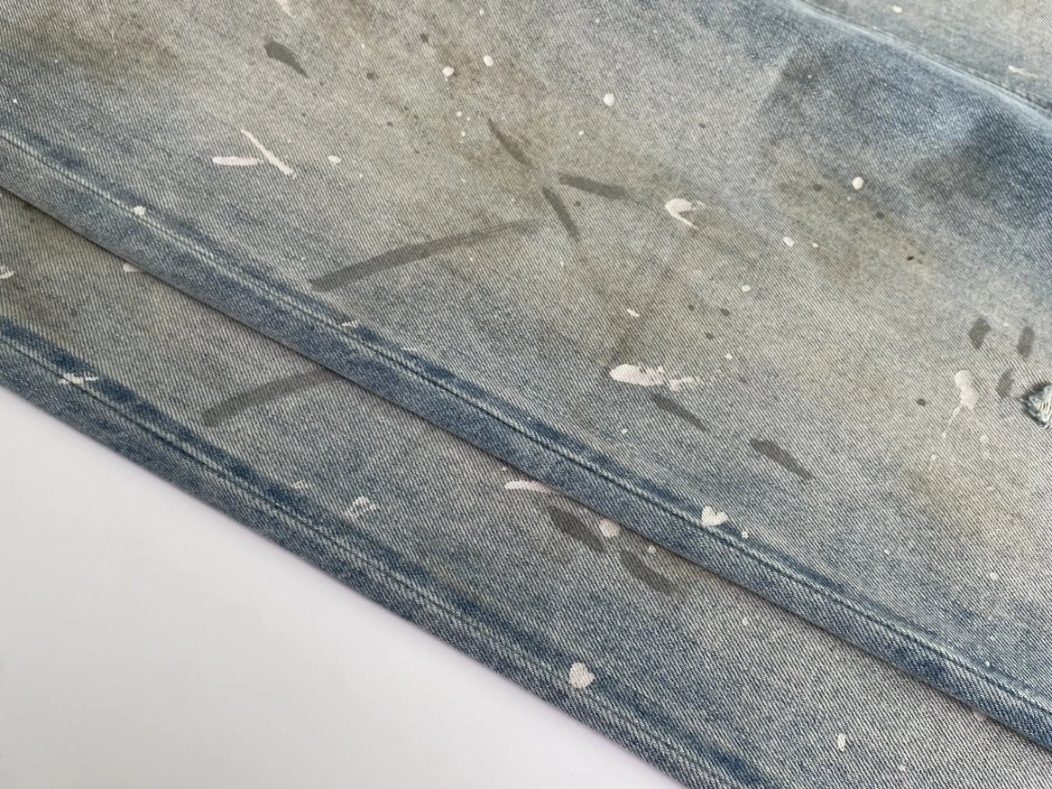 Design Wide-Leg Paint-Splatter Denim Jeans - 7