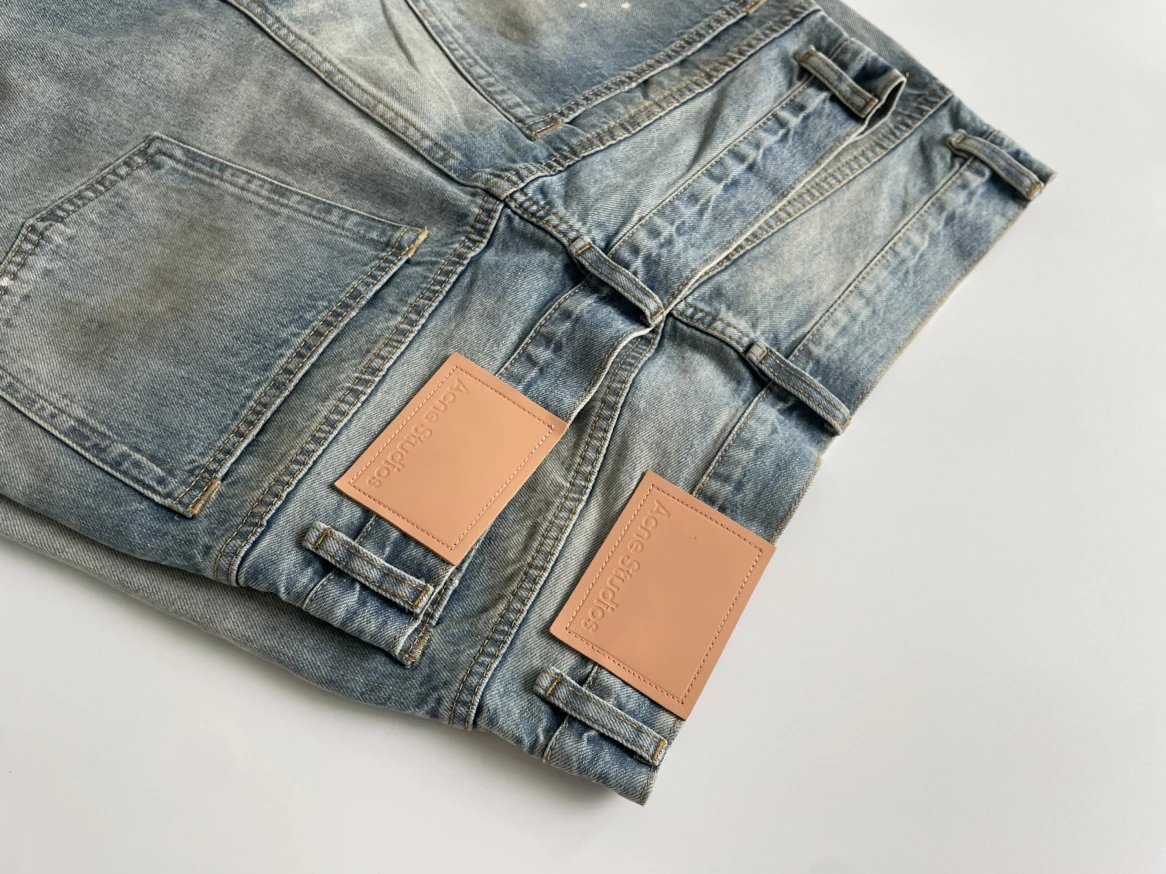 Design Wide-Leg Paint-Splatter Denim Jeans - 12