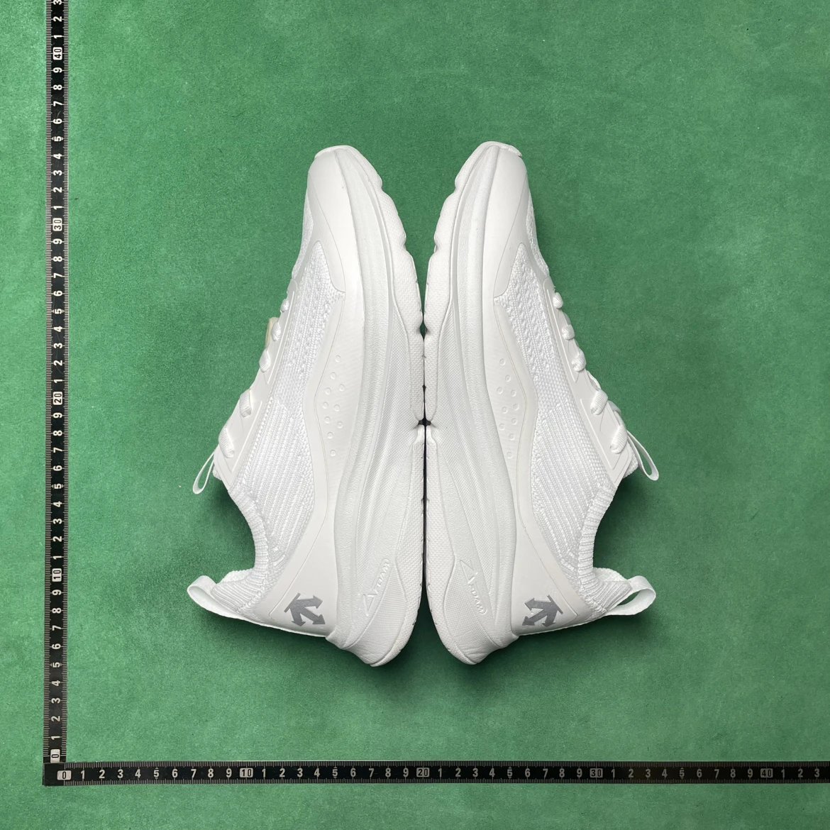 All-Wheel White Sneakers