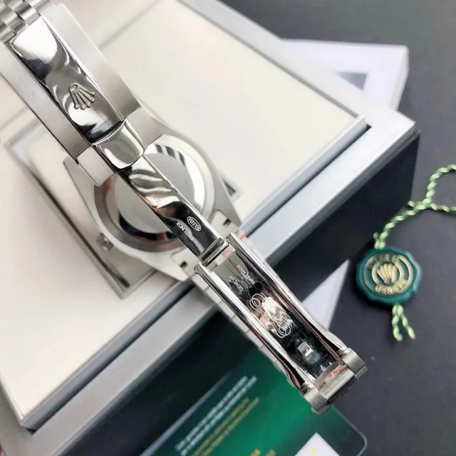 Rolex Watches Oyster Perpetual Datejust-style watch with fluted bezel, date magnifier, and jubilee bracelet product detail image 46