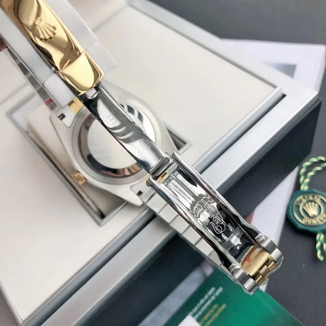 Rolex Watches Oyster Perpetual Datejust-style watch with fluted bezel, date magnifier, and jubilee bracelet product detail image 68