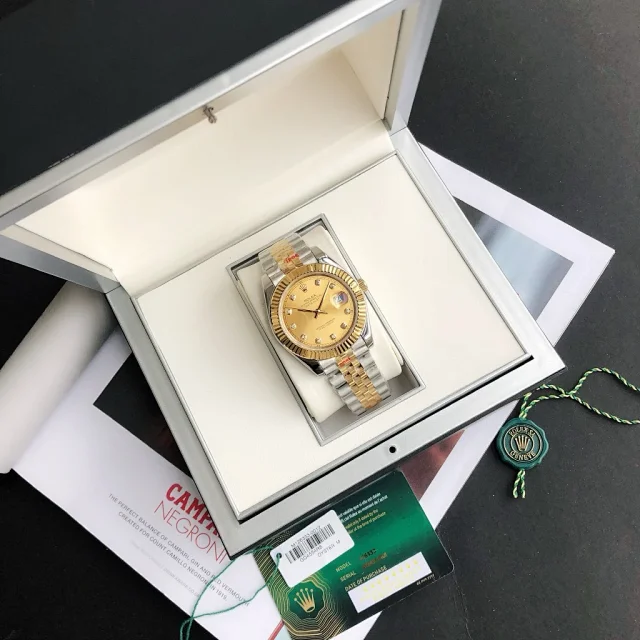 Rolex Watches Oyster Perpetual Datejust-style watch with fluted bezel, date magnifier, and jubilee bracelet product detail image 69
