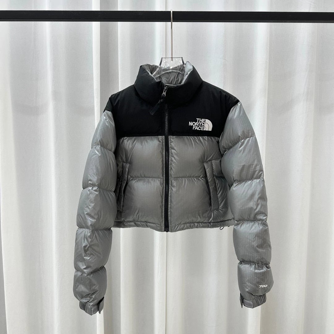 The North Face Down Jackets Cropped color-block puffer jacket — gray