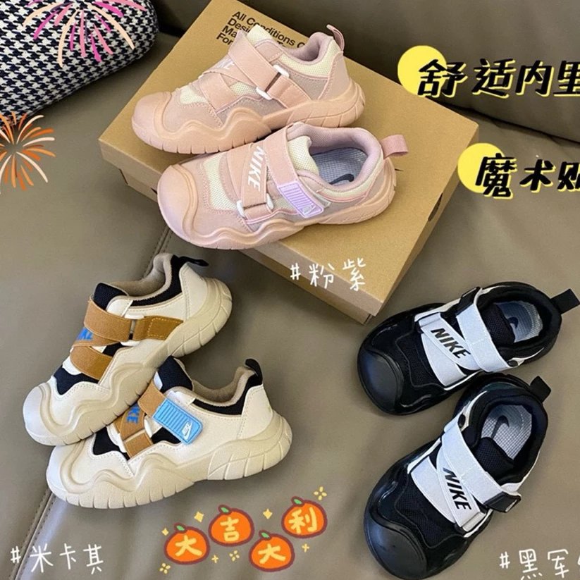 Kid Nike Velcro Sneakers in Pink, White, and Black