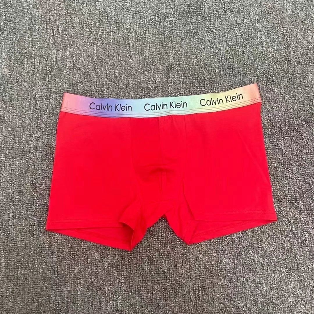Calvin Klein Underwear Men's boxer briefs with rainbow logo waistband — red
