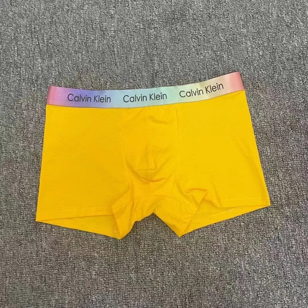 Calvin Klein Underwear Men's boxer briefs with rainbow logo waistband — yellow