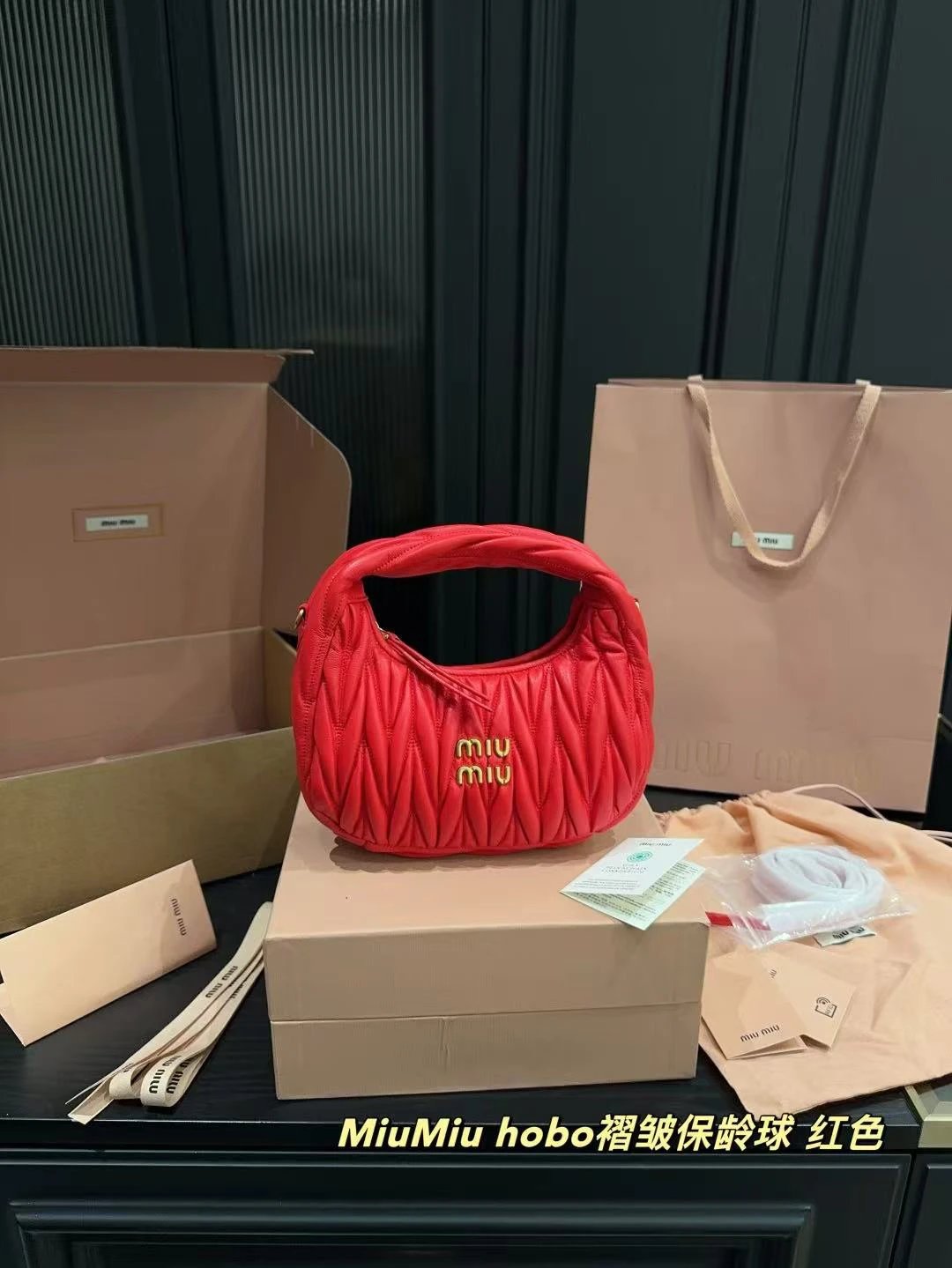 Miu Miu pleated armpit bag