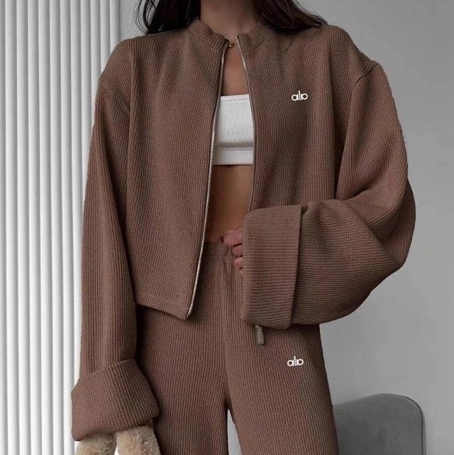 Alo Tracksuits Knitted zip-up jacket and wide-leg trousers set — Coffee color