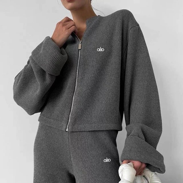 Alo Tracksuits Knitted zip-up jacket and wide-leg trousers set — gray