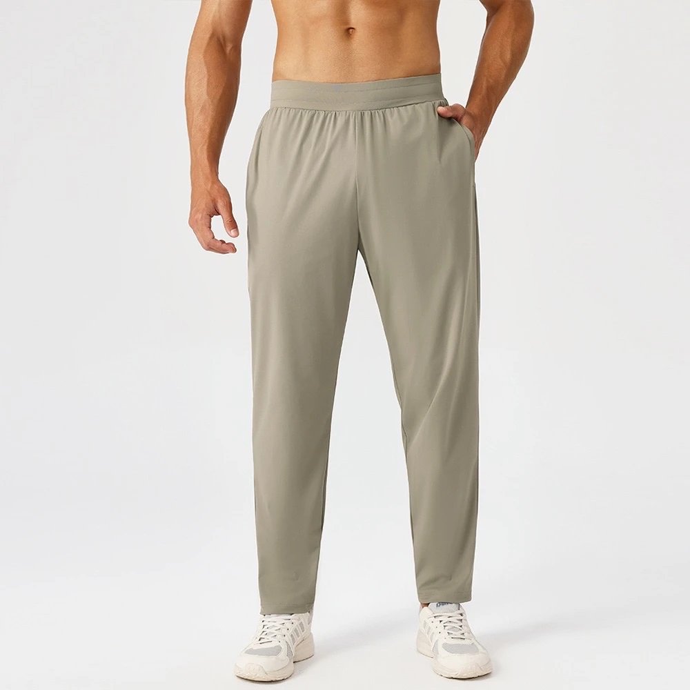Alo Trousers Drawstring tapered training with side pockets — Khaki