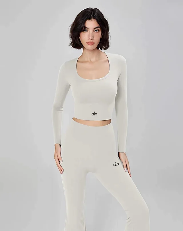 Alo Yoga Shirts Women's long-sleeve cropped athletic top with built-in bra product detail image 24