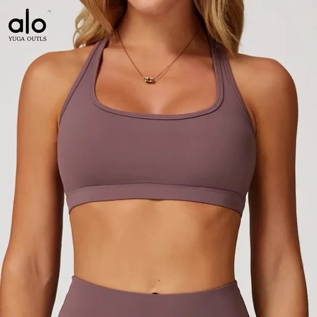 Alo Yoga Racerback sports bra with high-waisted shorts or flared leggings product detail image 10