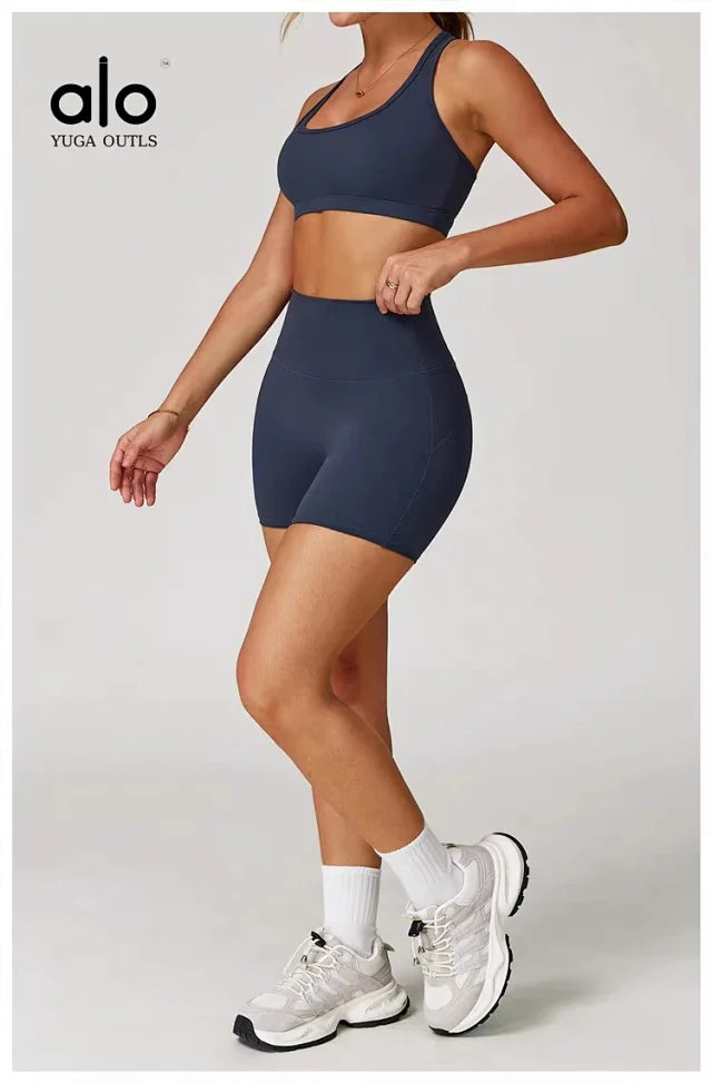 Alo Yoga Racerback sports bra with high-waisted shorts or flared leggings product detail image 38