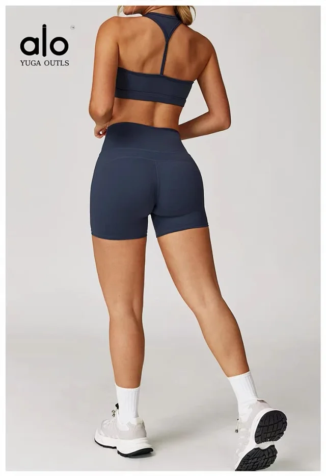 Alo Yoga Racerback sports bra with high-waisted shorts or flared leggings product detail image 39
