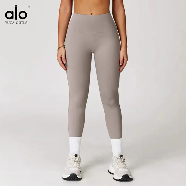 Alo Yoga Racerback sports bra with high-waisted shorts or flared leggings product detail image 18