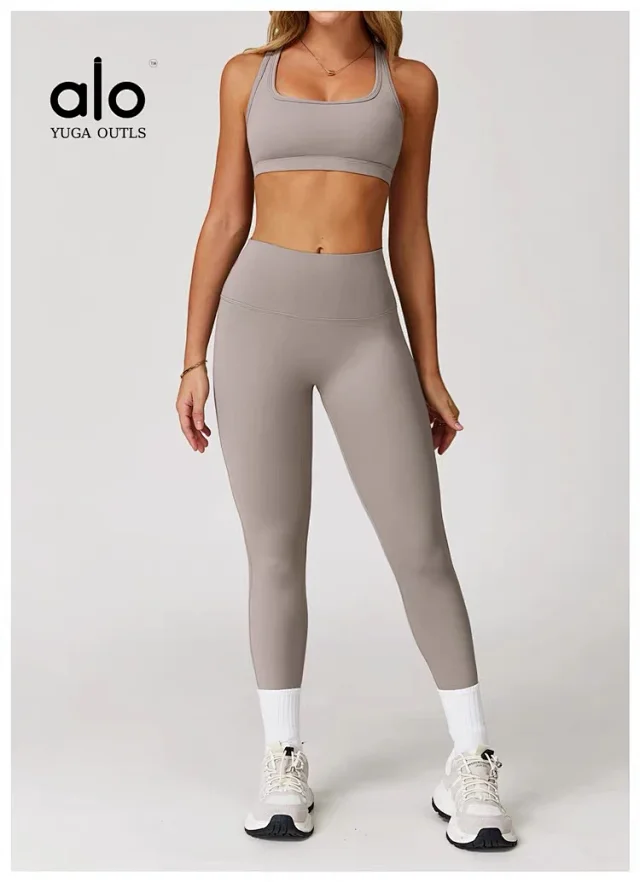 Alo Yoga Racerback sports bra with high-waisted shorts or flared leggings product detail image 42