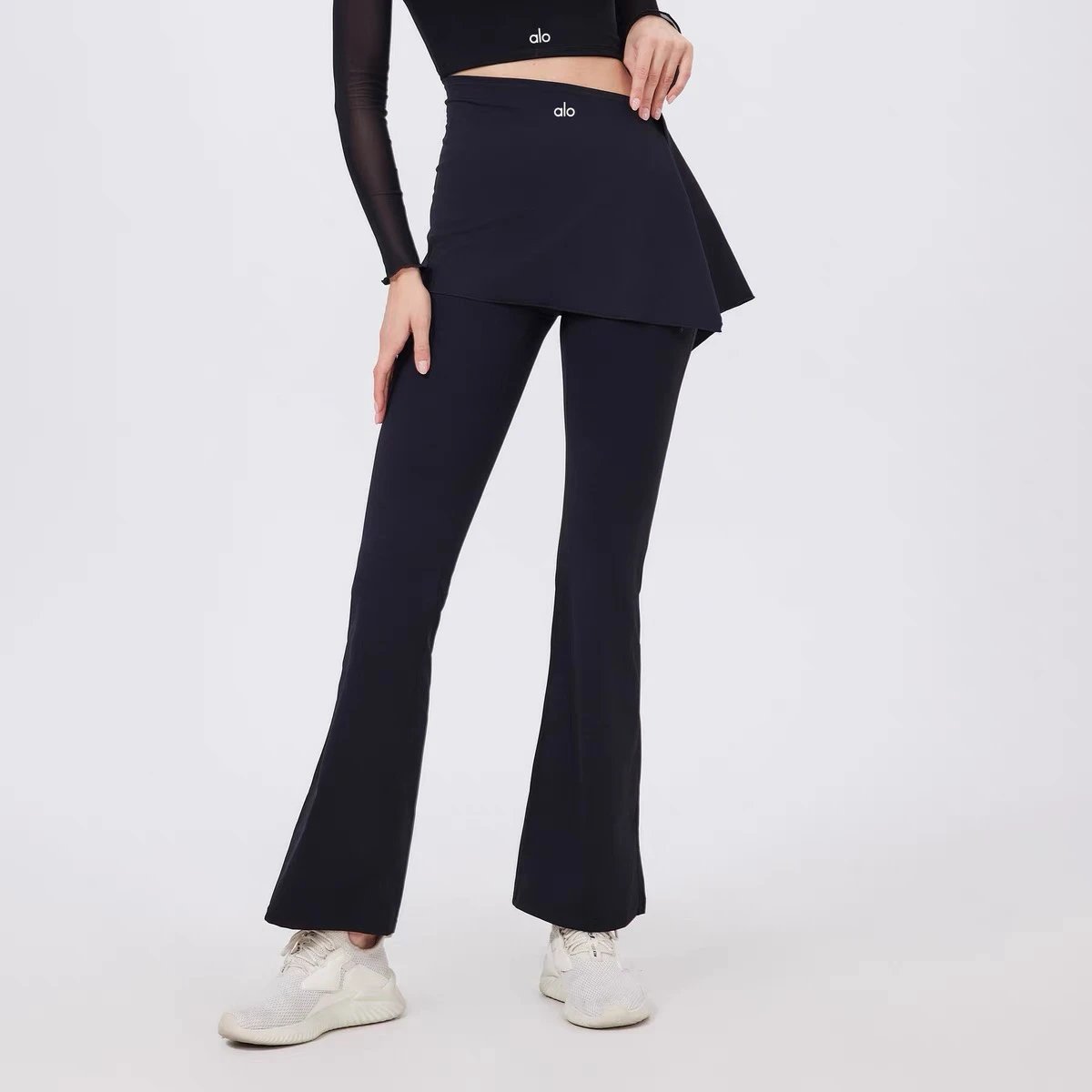 Alo Yoga Trousers High-waisted flared leggings with wrap skirt overlay image 7