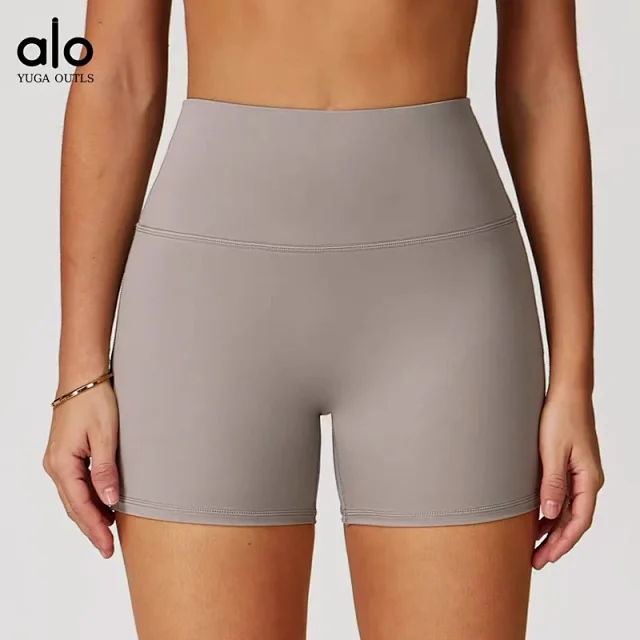 Alo Yoga Racerback sports bra with high-waisted shorts or flared leggings product detail image 13