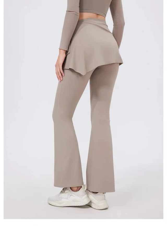 Alo Yoga Trousers High-waisted flared leggings with wrap skirt overlay product detail image 28