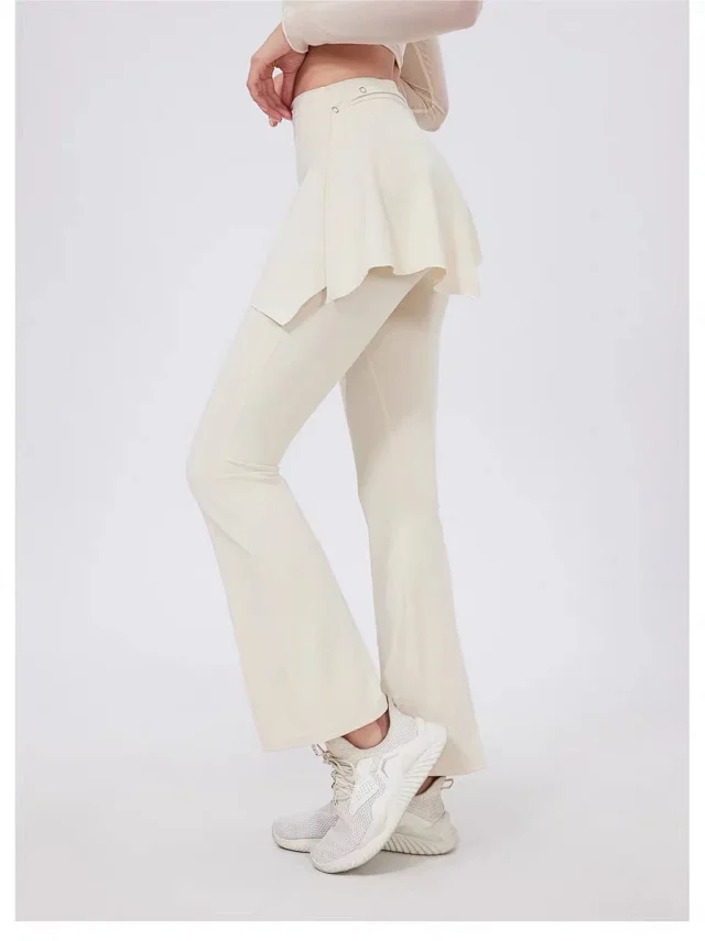 Alo Yoga Trousers High-waisted flared leggings with wrap skirt overlay product detail image 32