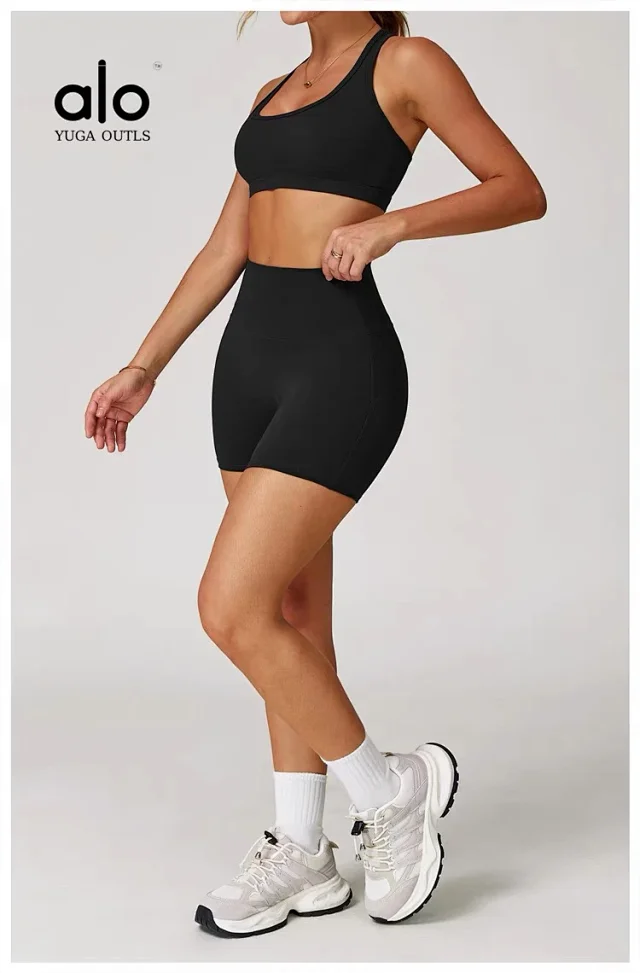 Alo Yoga Racerback sports bra with high-waisted shorts or flared leggings product detail image 54