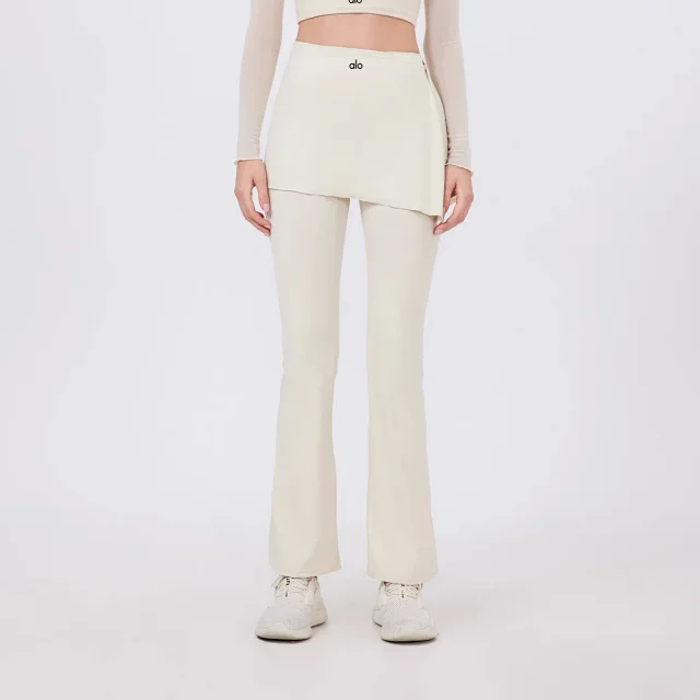 Alo Yoga Trousers High-waisted flared leggings with wrap skirt overlay product detail image 8