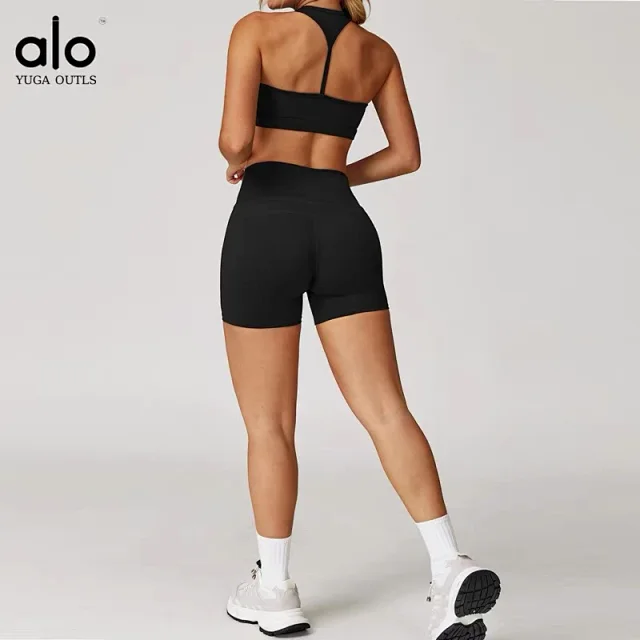 Alo Yoga Racerback sports bra with high-waisted shorts or flared leggings product detail image 2