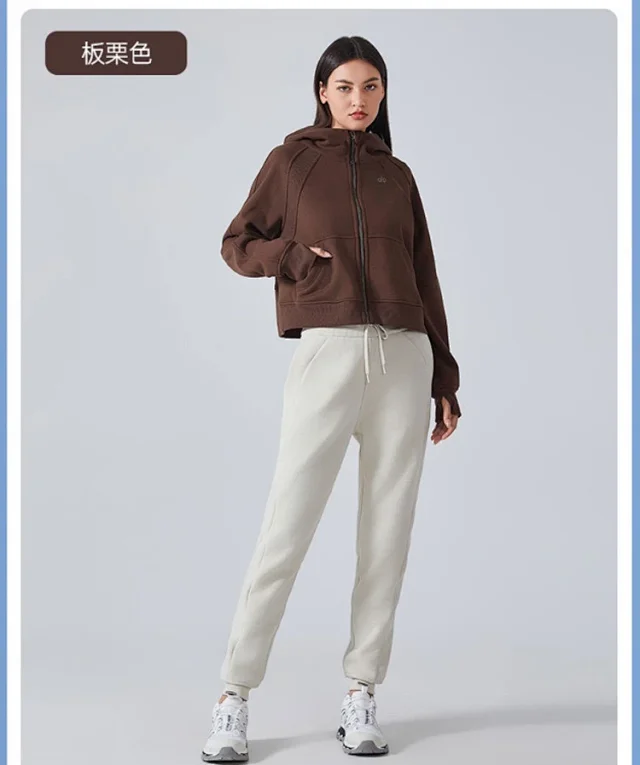 Alo Yoga Hoodies & Sweatshirts Cropped zip-front hooded sweatshirt with kangaroo pockets product detail image 24