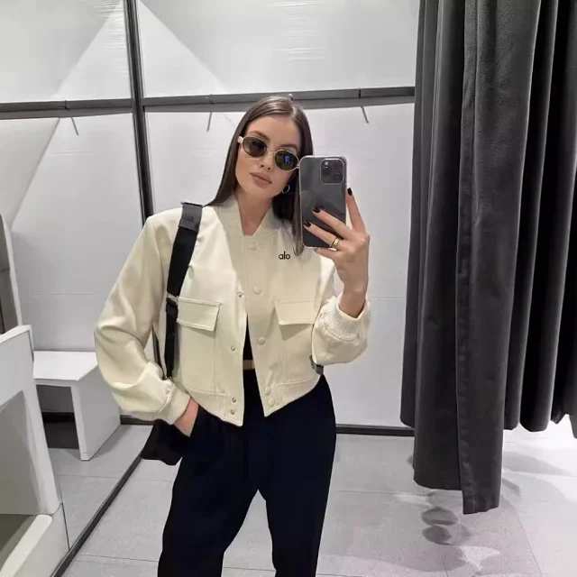 Alo Yoga Jackets Cropped bomber jacket with flap pockets product detail image 1