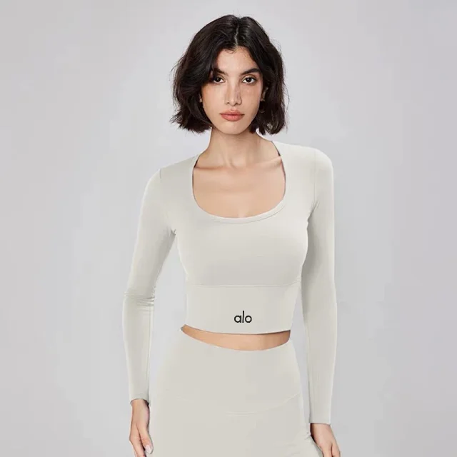 Alo Yoga Shirts Women's long-sleeve cropped athletic top with built-in bra product detail image 10