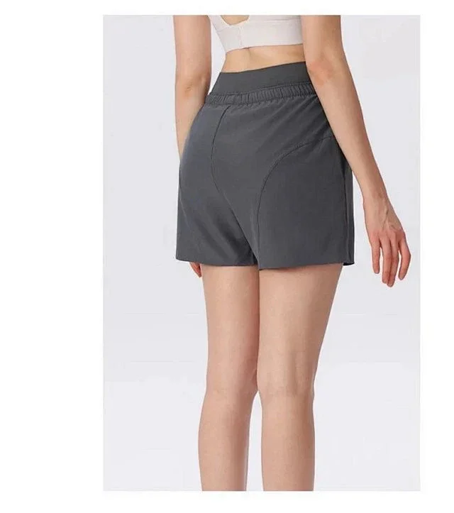 Alo Yoga Shorts High-waisted curved-seam athletic product detail image 12