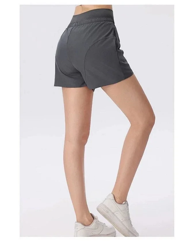 Alo Yoga Shorts High-waisted curved-seam athletic product detail image 11