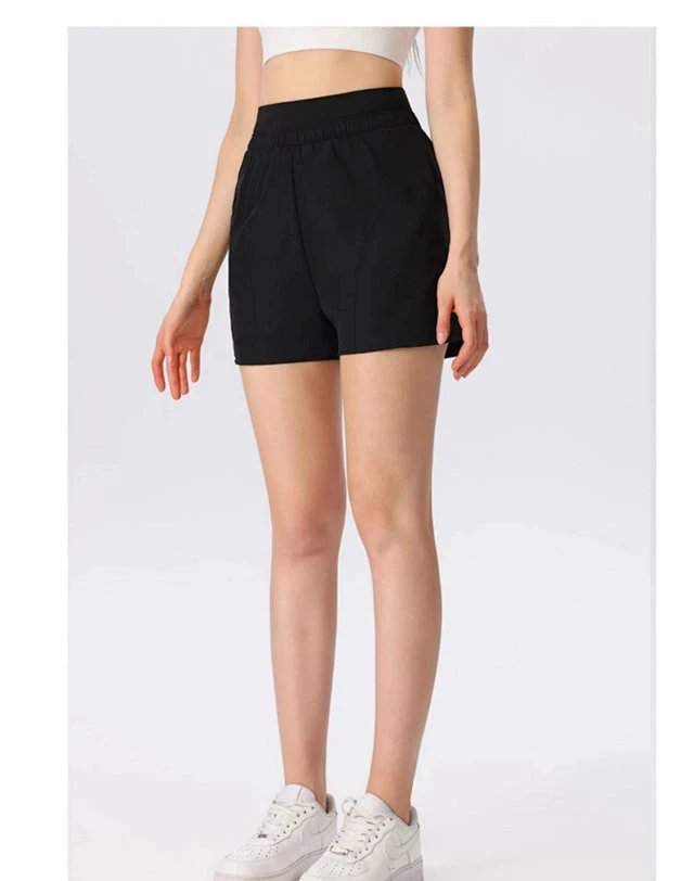 Alo Yoga Shorts High-waisted curved-seam athletic image 3