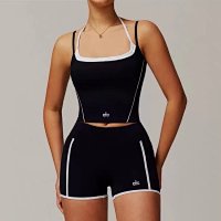 Black vest, black shorts
