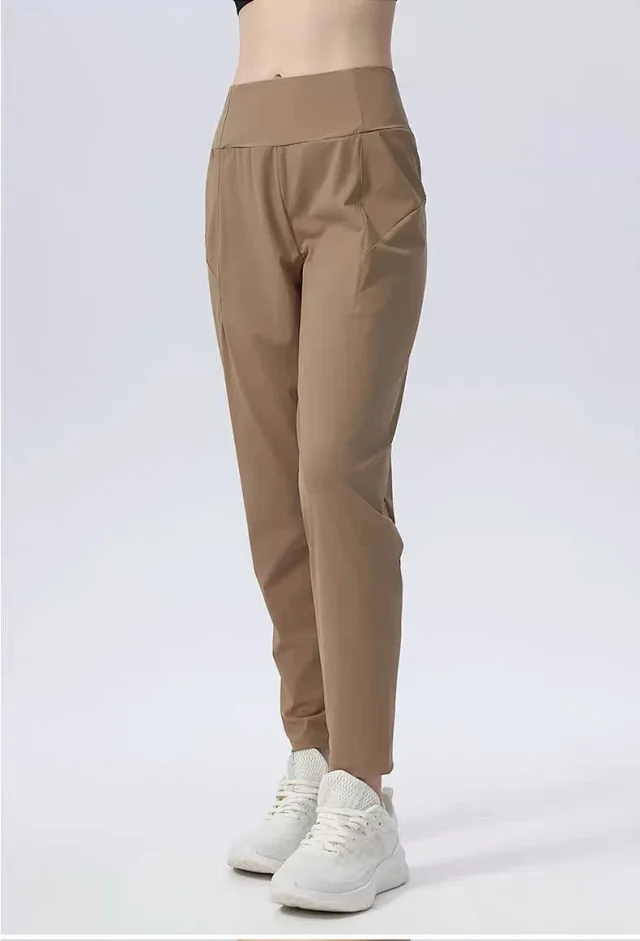 Alo Yoga Trousers High-Waisted Tapered Performance product detail image 20
