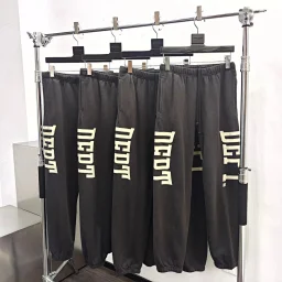 thumbnail for GD lettered sweatpants on both sides