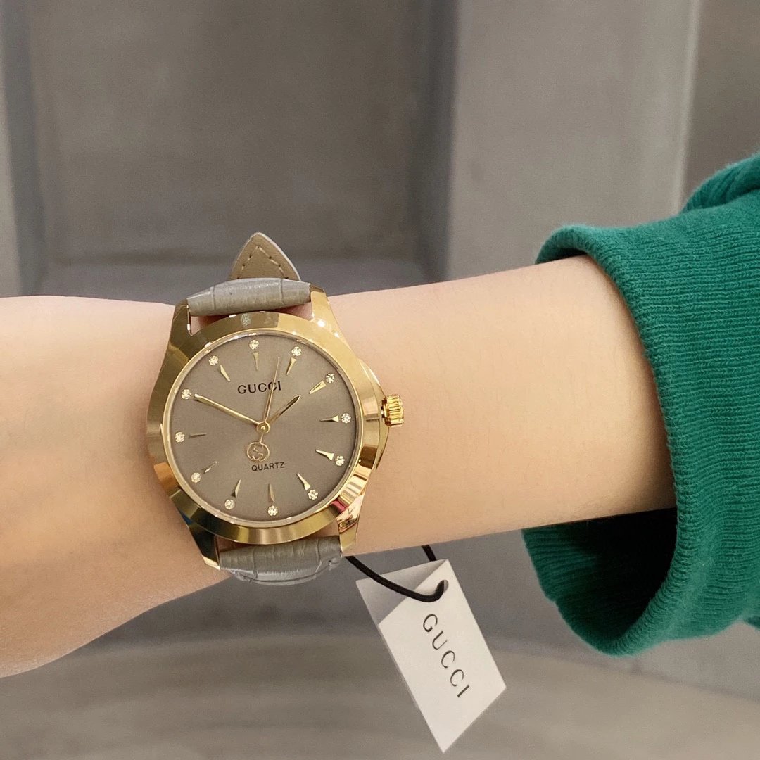 Gucci Quartz Watch Gray Leather Strap Elegant Women's Watch