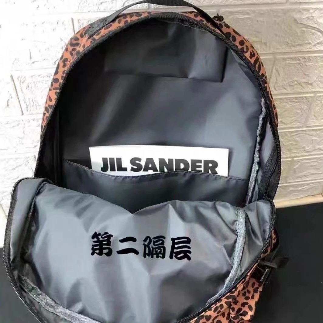 20SS双肩包户外休闲男女学生大容量书包20FW豹纹旅行双肩背包 6