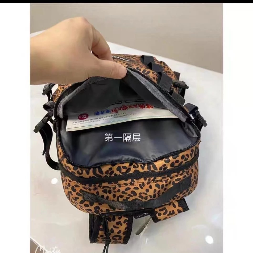 20SS双肩包户外休闲男女学生大容量书包20FW豹纹旅行双肩背包 7