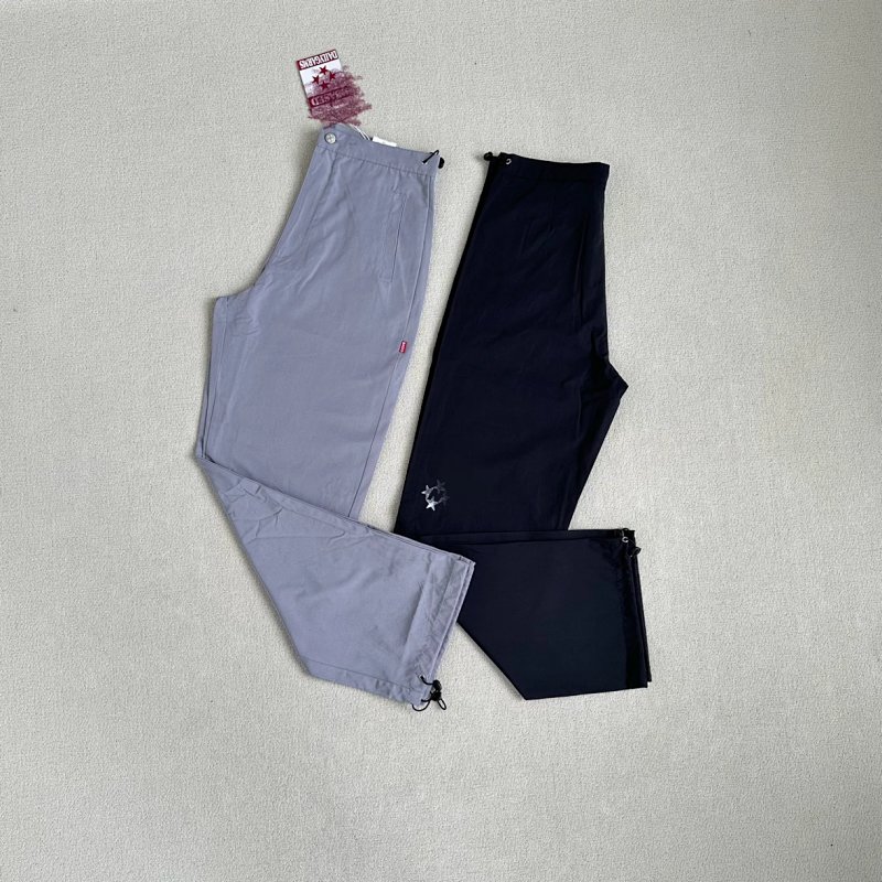 （99 embroidered logo tech pants）