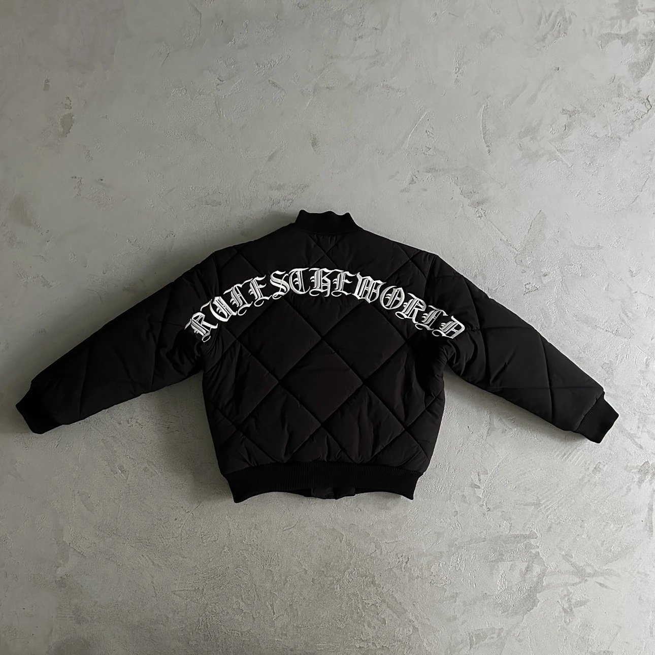 Corteiz Olde English Quilted Bomber (Black)