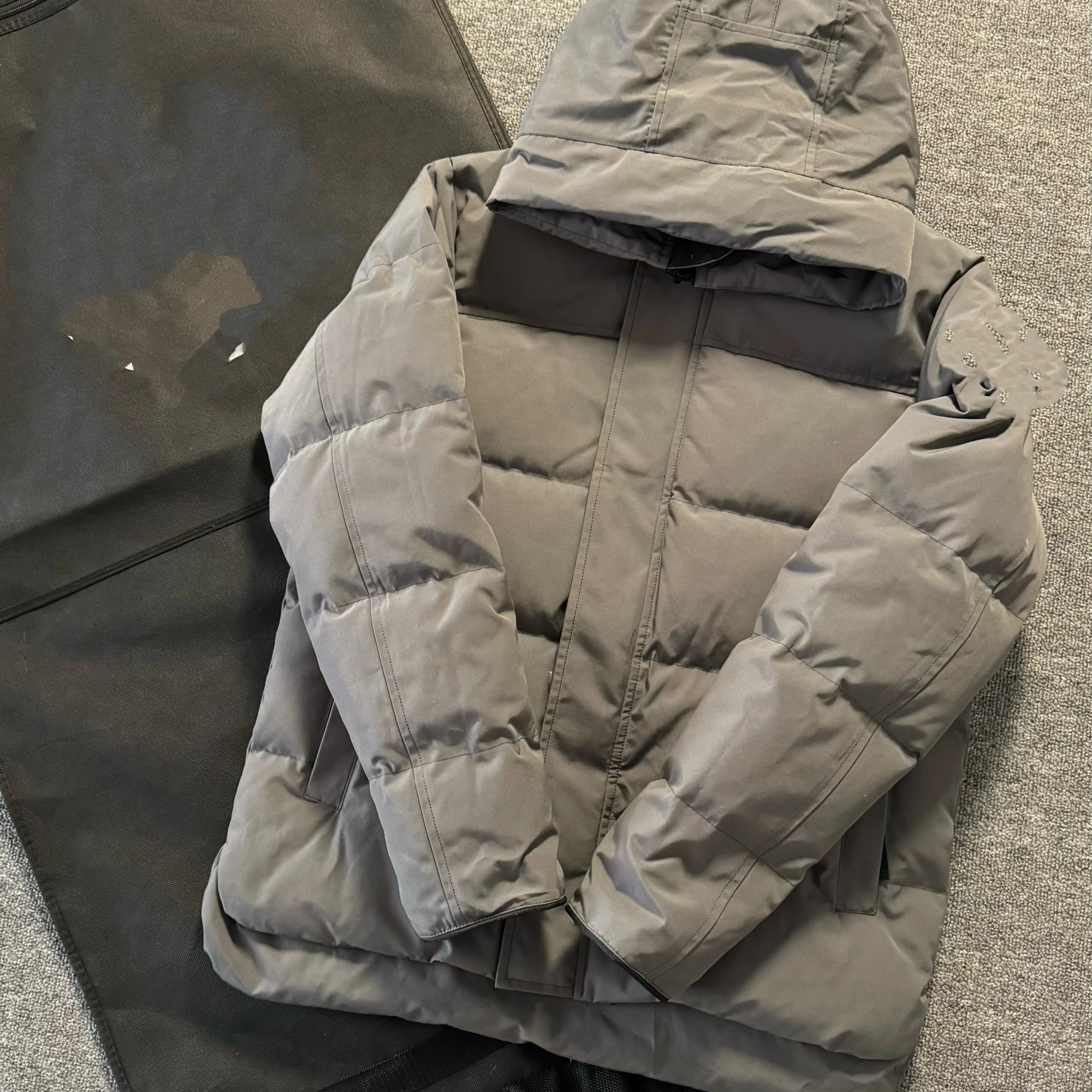 Grey with black badge